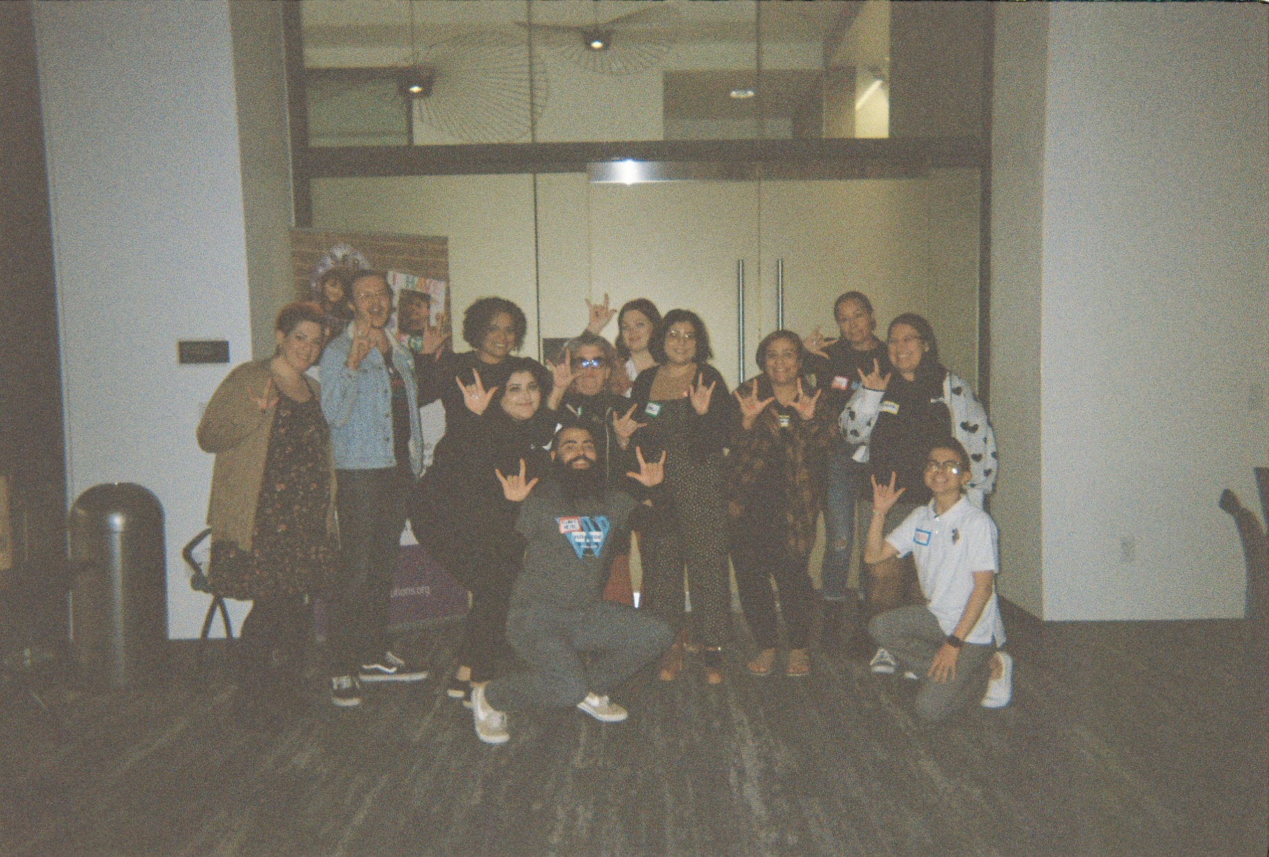 a group of people posing for a picture.